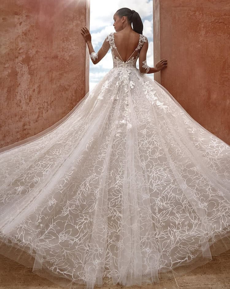 Flaminia dos Pronovias robe de mariée princesse dentelle top décolleté V manches tulle applications dentelle 3:4 magasin de robes de mariée Paris