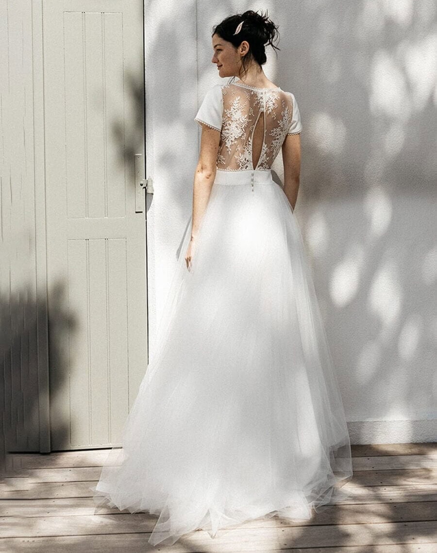 Tamja dos Lambert Créations robe de mariée princesse top mousseline décolleté V manches courtes jupe tulle plat magasin de robes de mariée Annecy