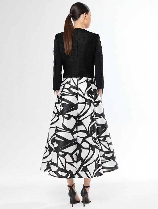 51572 dos Carla Ruiz veste courte à frange noir magasin de robes de soirée Paris