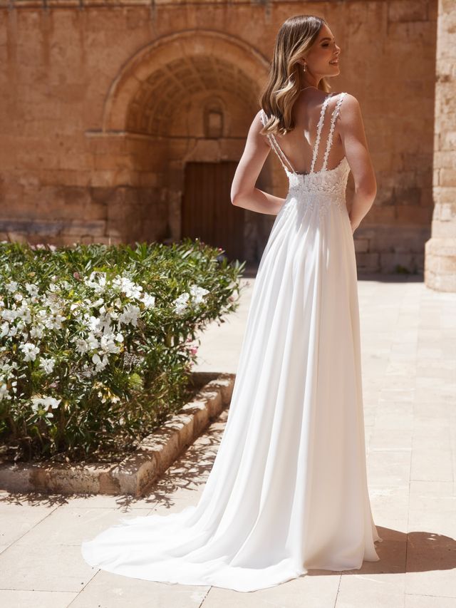 Kerena dos Bianco evento robe de mariée A-line trapèze top décolleté V dentelle dos bretelles doubles jupe mousseline fendue boutique de robes de mariée Annecy