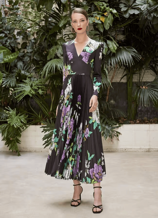 50637 face Carla Ruiz robe de soirée mi-longue top décolleté V manches longues ballons ceinture large taille jupe midi plissée magasin de robes de soirée Paris