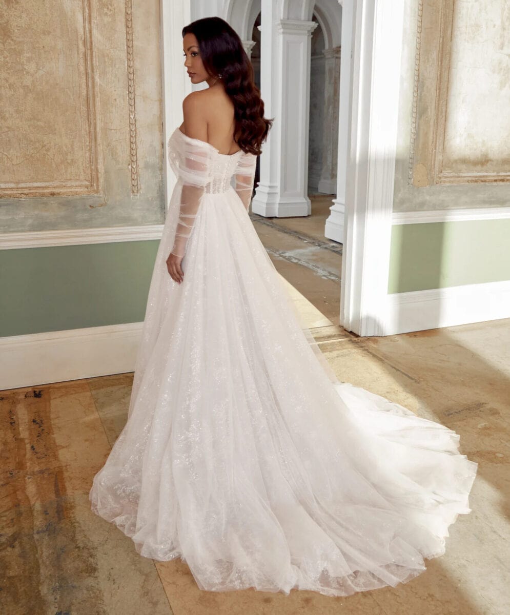 44562 dos Justin Alexander robe de mariée trapèze bustier coeur drapé tulle manches longues jupe pailletée fendue traîne magasin de robes de mariée Nogent sur Marne