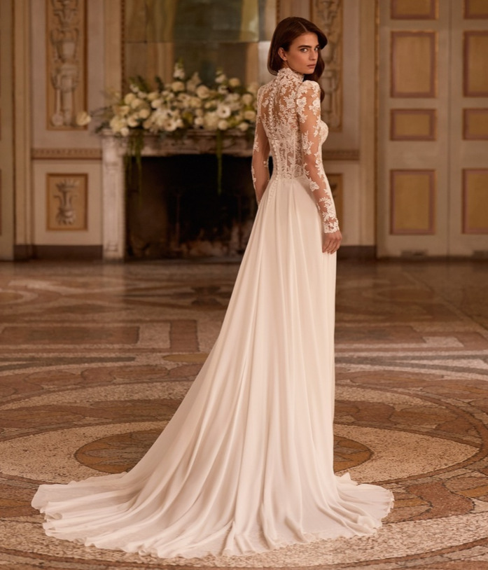 Cosmos dos Alberto Palatchi robe de mariée fluide A-line trapèze bustier corset dentelle bolero manches longues traîne magasin de robes de mariée Annecy