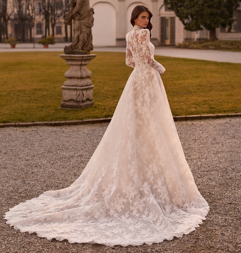 Palmaria dos Alberto Palatchi robe de mariée bustier dentelle bolero manches longues traînes magasin de robes de mariée Annecy